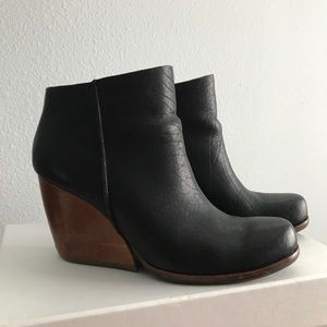 Black and brown wedge booties
